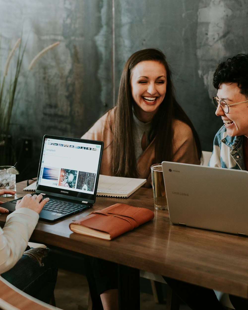 Team members working together at a table